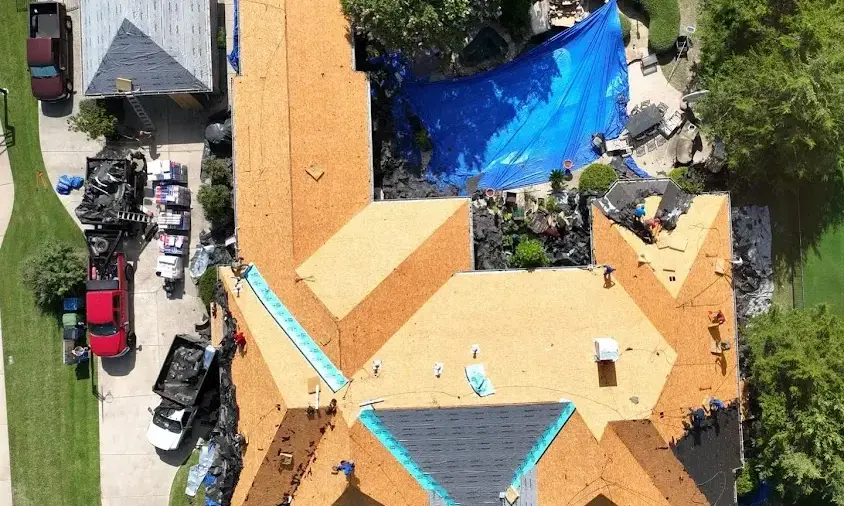 Professional Storm Damage Roof Repair being performed in Southlake
